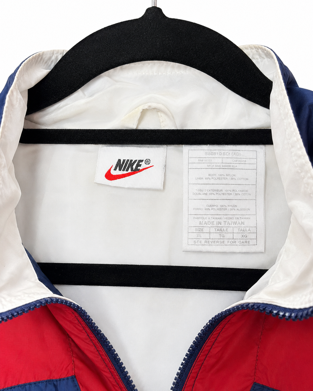 Vintage Nike Trainingsjacke – Innenetikett und Pflegehinweise